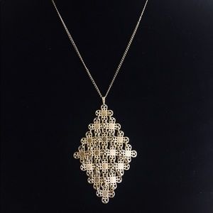 Sarah.Gold Tone Dangling Diamond Shape Necklace